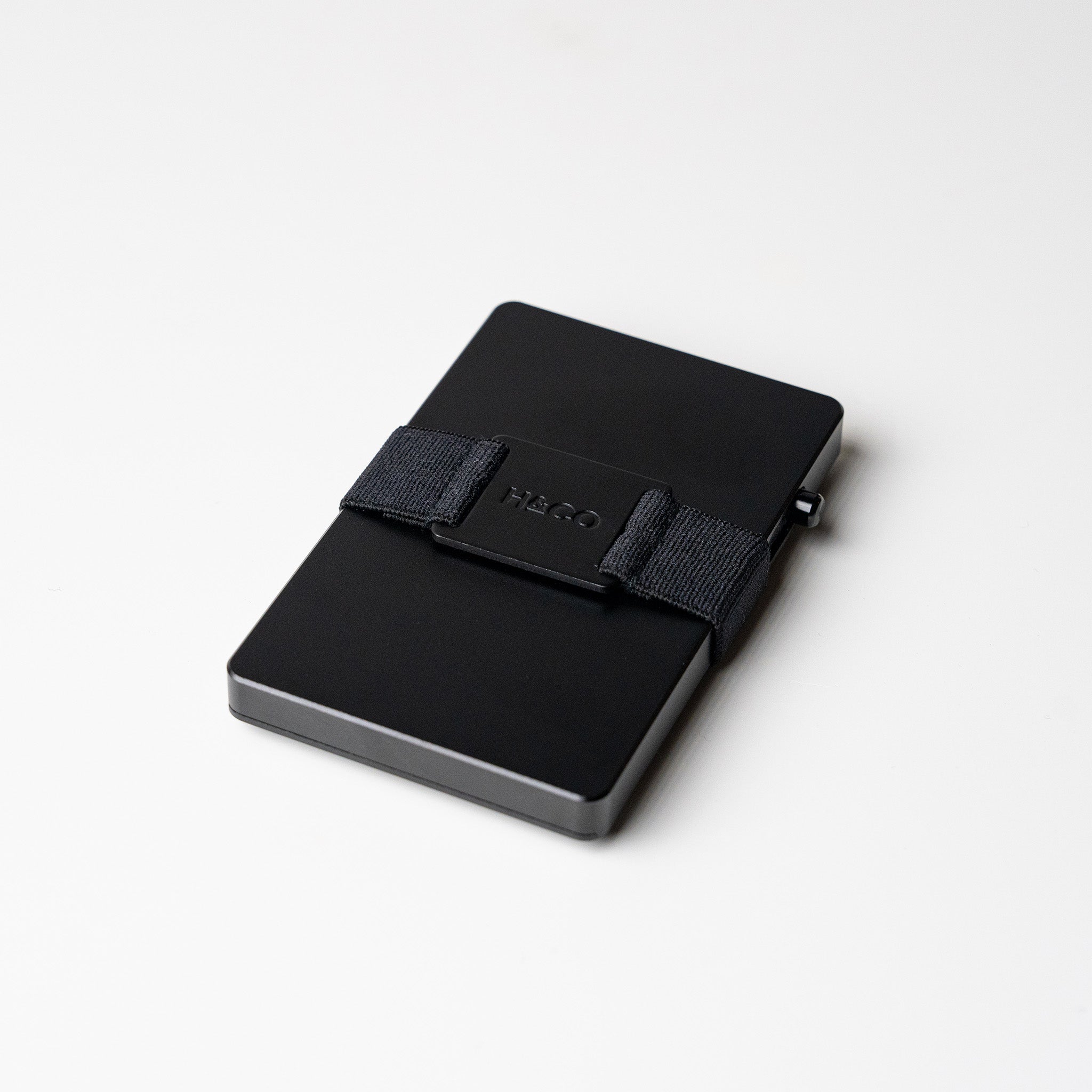 Midnight Black Evolve Smart Wallet on white background