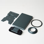 Steel Blue wallet with airtag holder, backplate, band and magnetic ring laid flat in bundle configuration