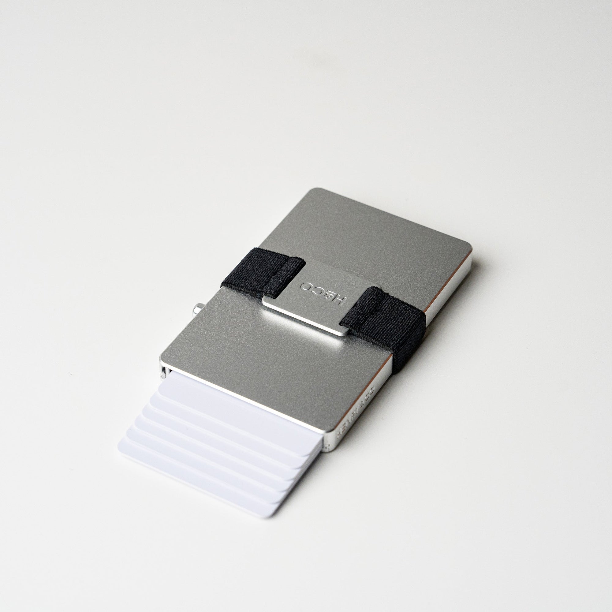 Platinum wallet fanned open showing card capacity on clean white background