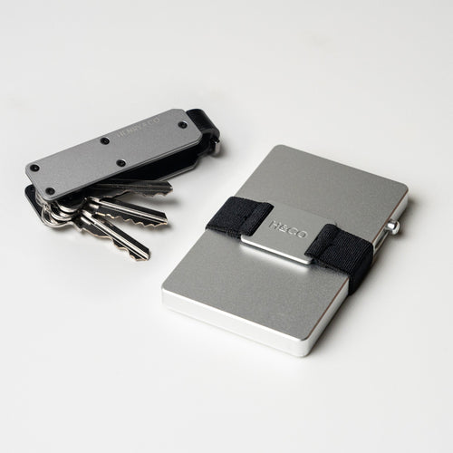 Vault Key Case in Platinum paired with Evolve Smart Wallet on white background