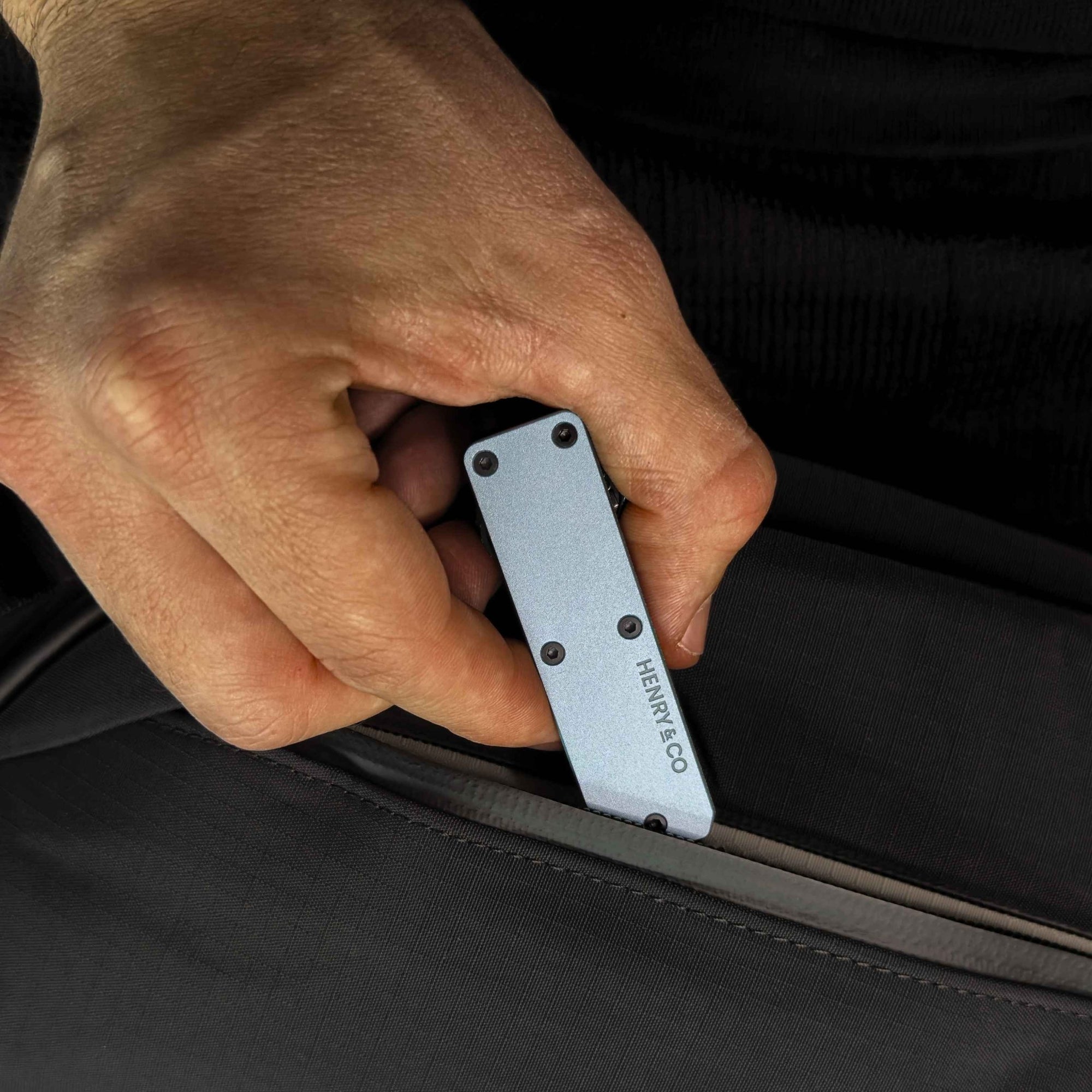 Steel Blue Vault Key Case being removed from travel bag