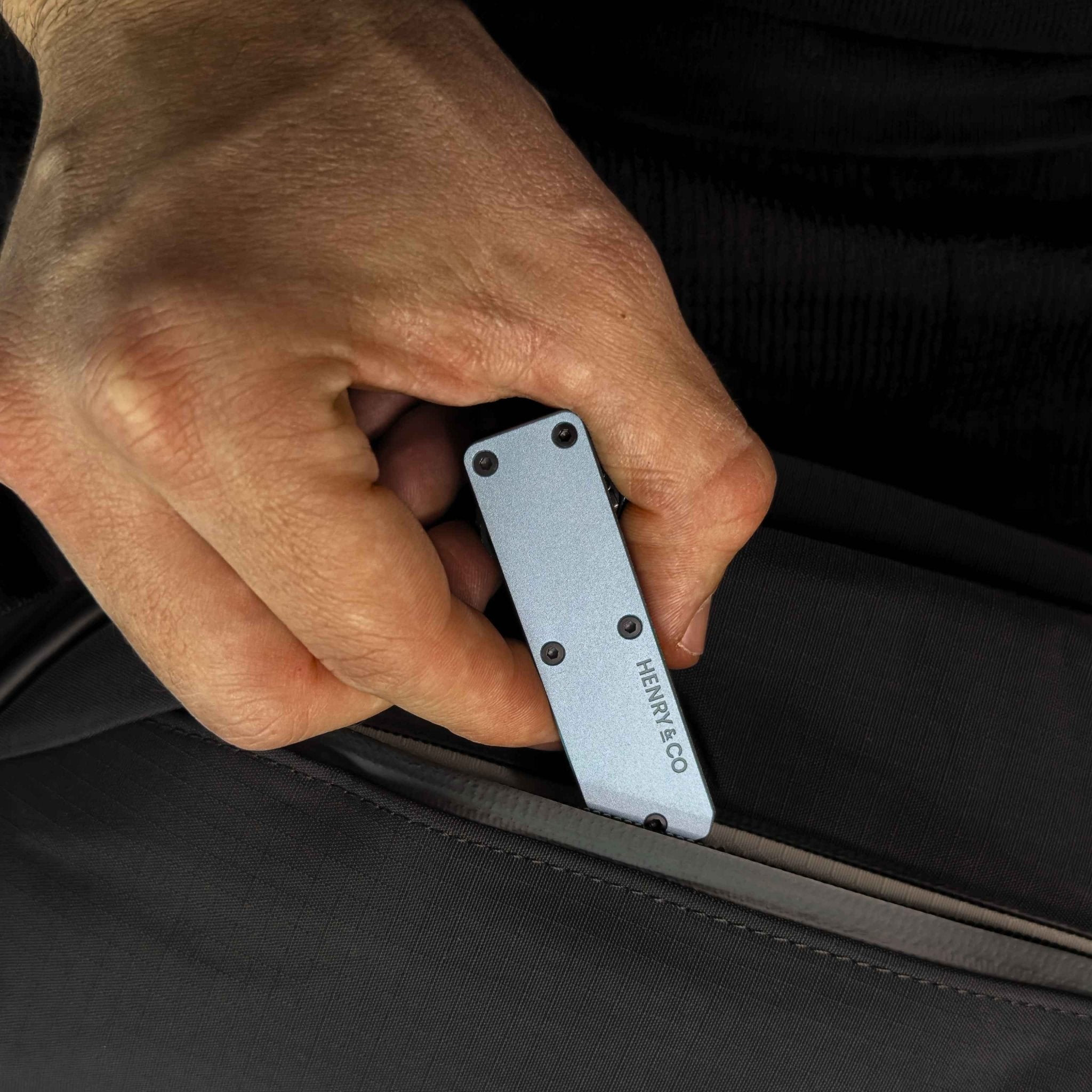 Steel Blue Vault Key Case being removed from travel bag