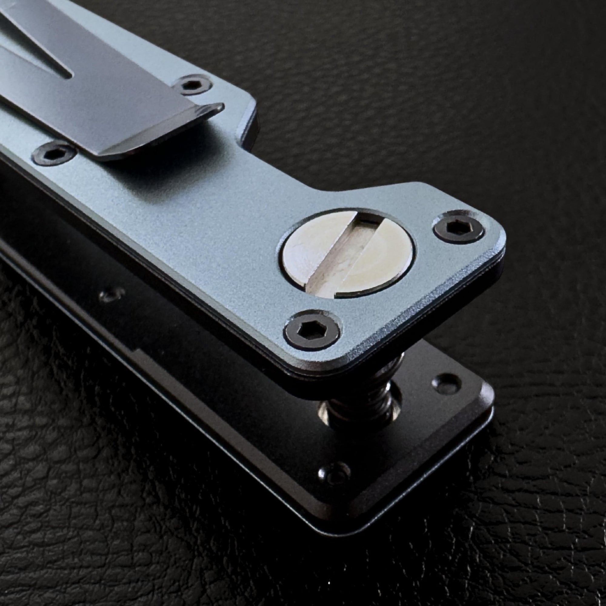 Steel Blue Vault Key Case close-up of mechanism on black leather