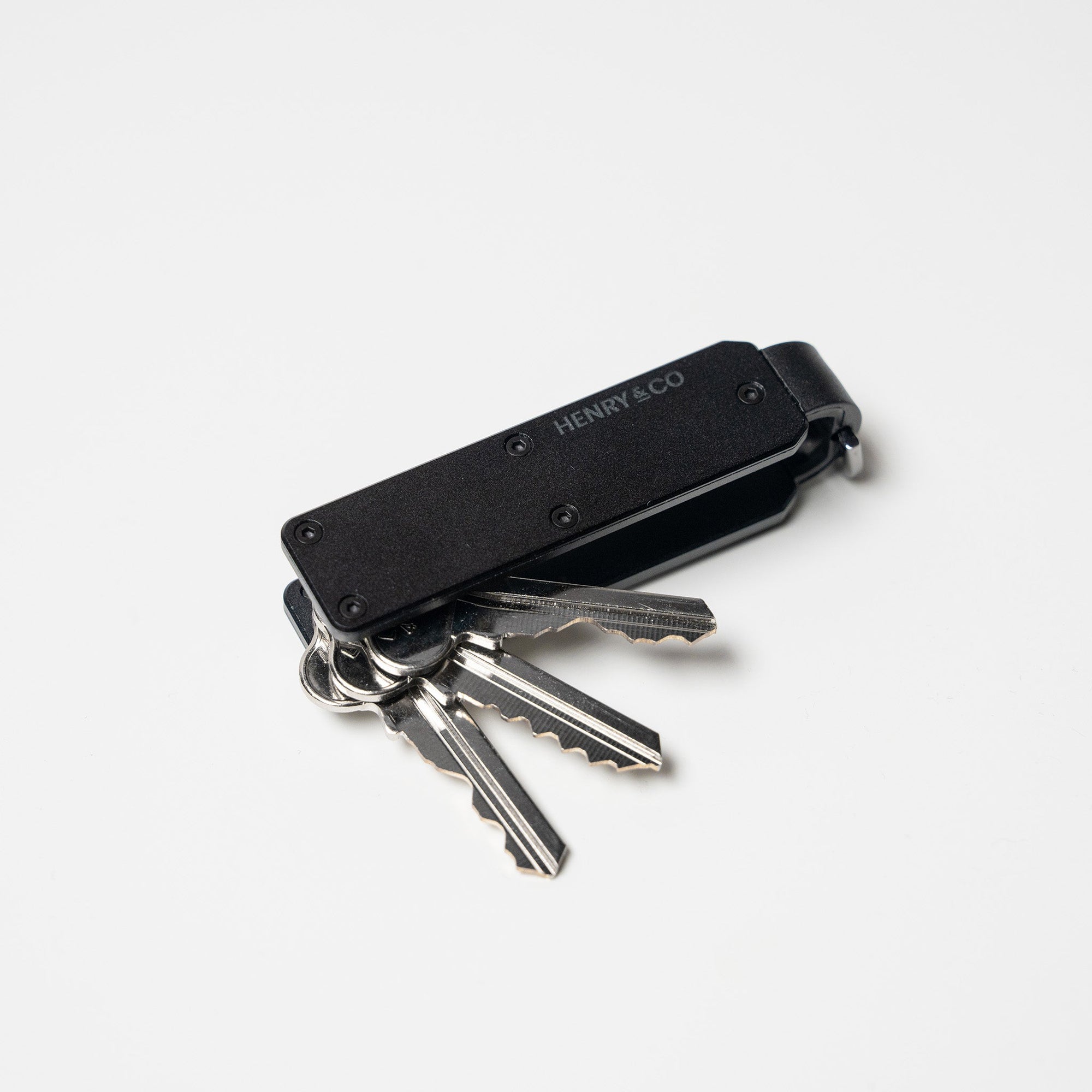 Midnight Black Vault Key Case with keys fanned out on white background