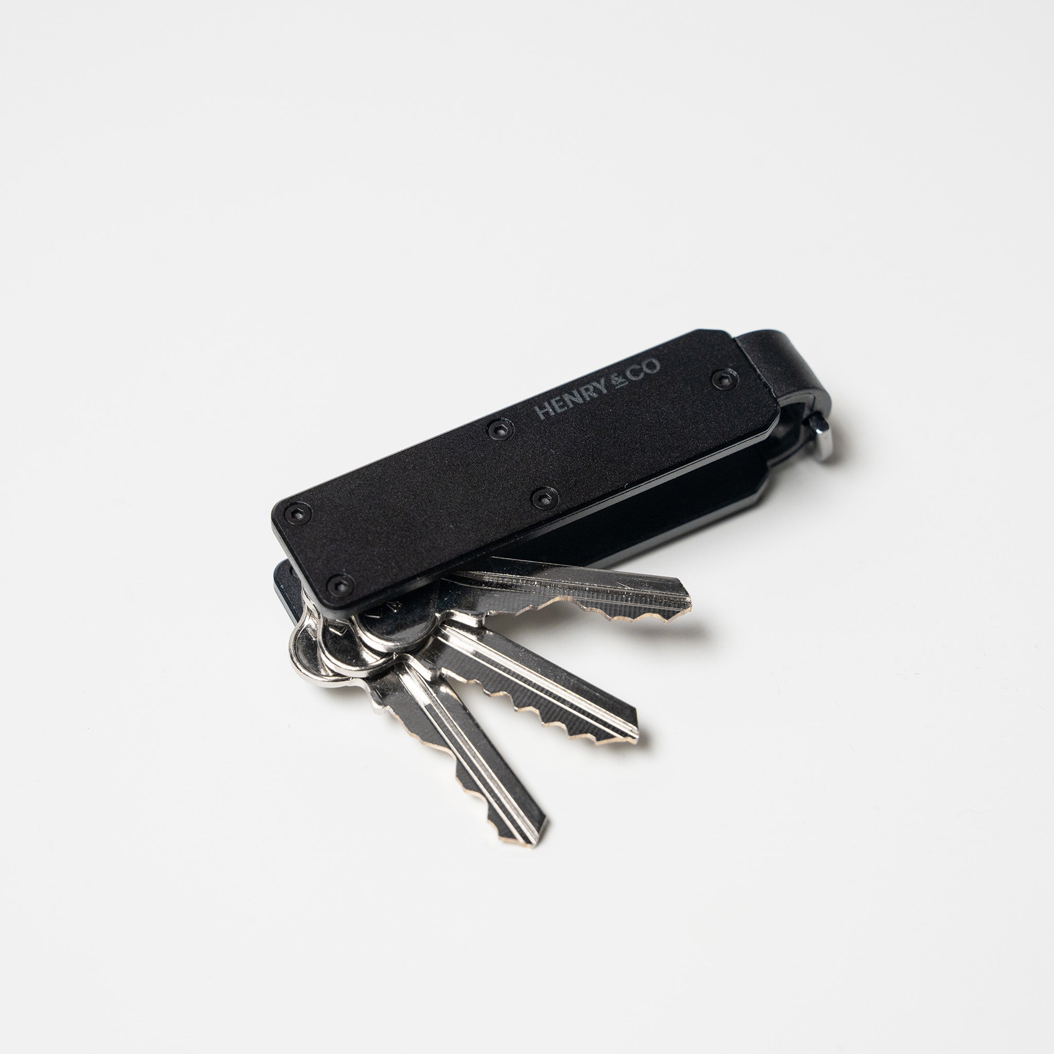 Midnight Black Vault Key Case with keys fanned out on white background