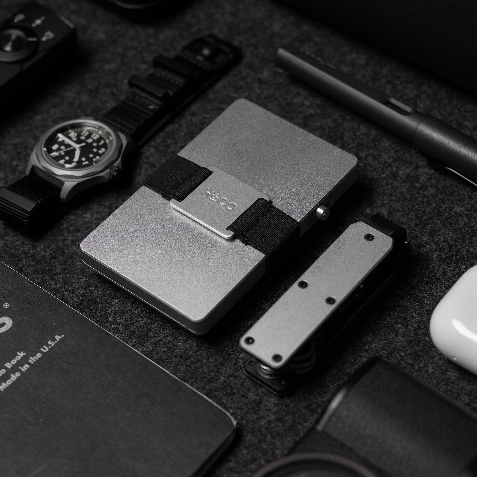 Platinum Vault Key Case styled alongside Platinum Evolve Smart Wallet