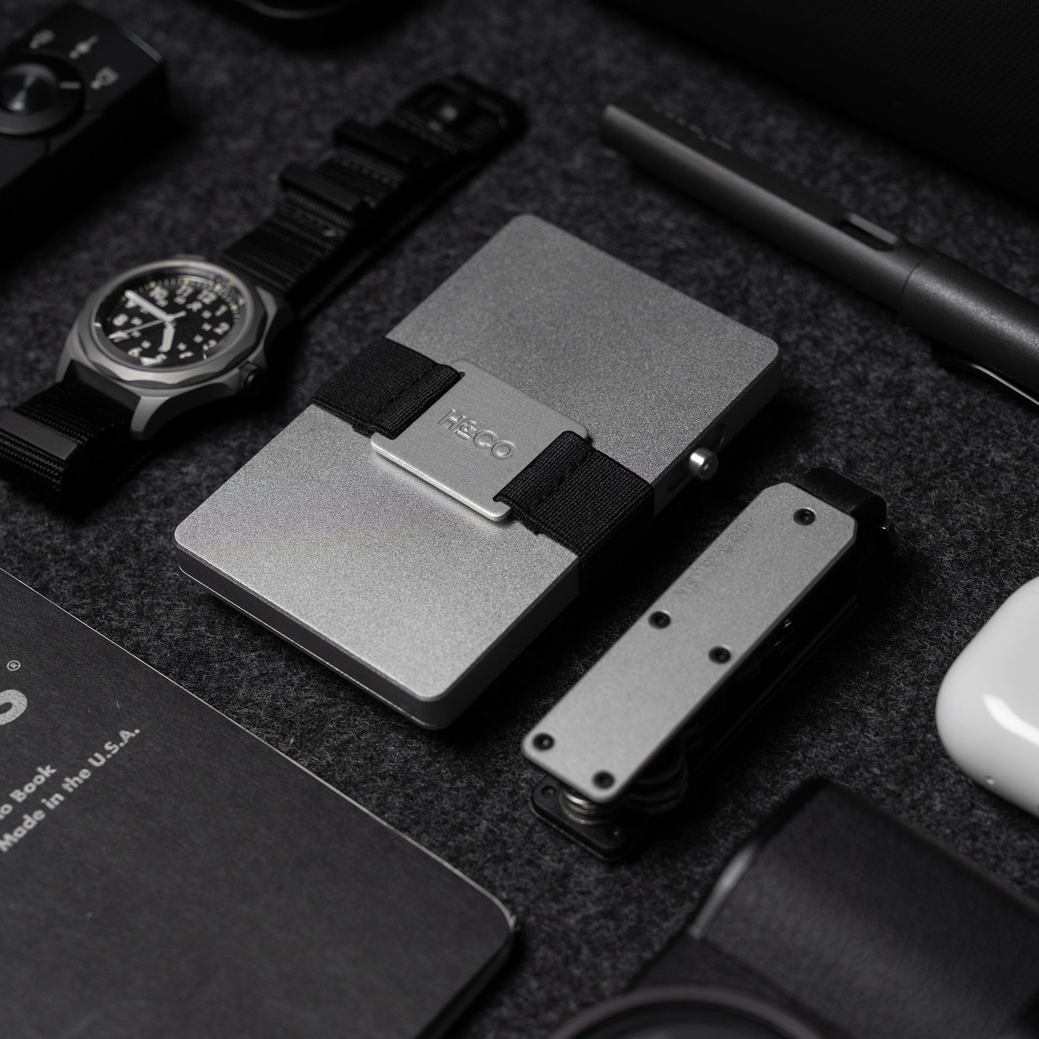 Platinum Vault Key Case styled alongside Platinum Evolve Smart Wallet